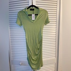 Mint green asymmetrical hem rouched mini dress.        Brand is Cider. Size XS